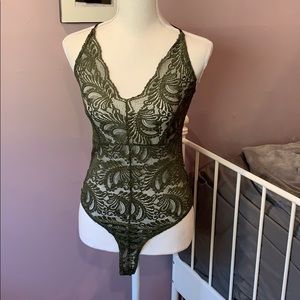 Green lace body suit